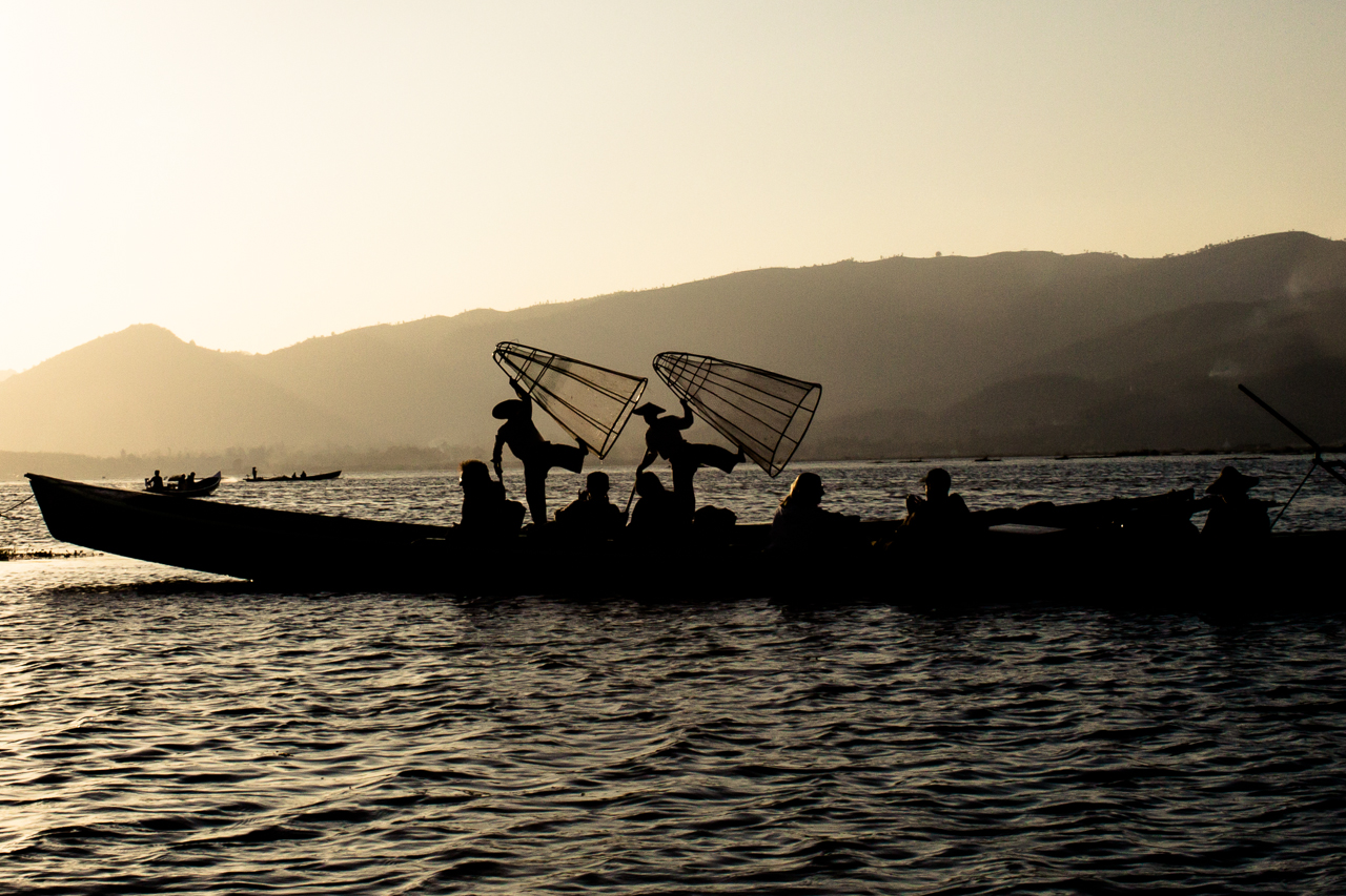 Myanmar Inle fishermen and tourists